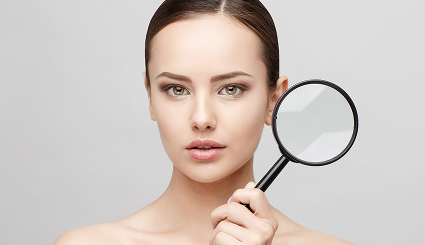 woman with a magnifying glass